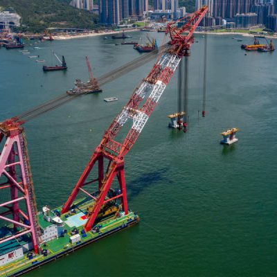 Tseung Kwan O, Hong Kong 19 May 2020:  Top view fly over the sea with floating crane